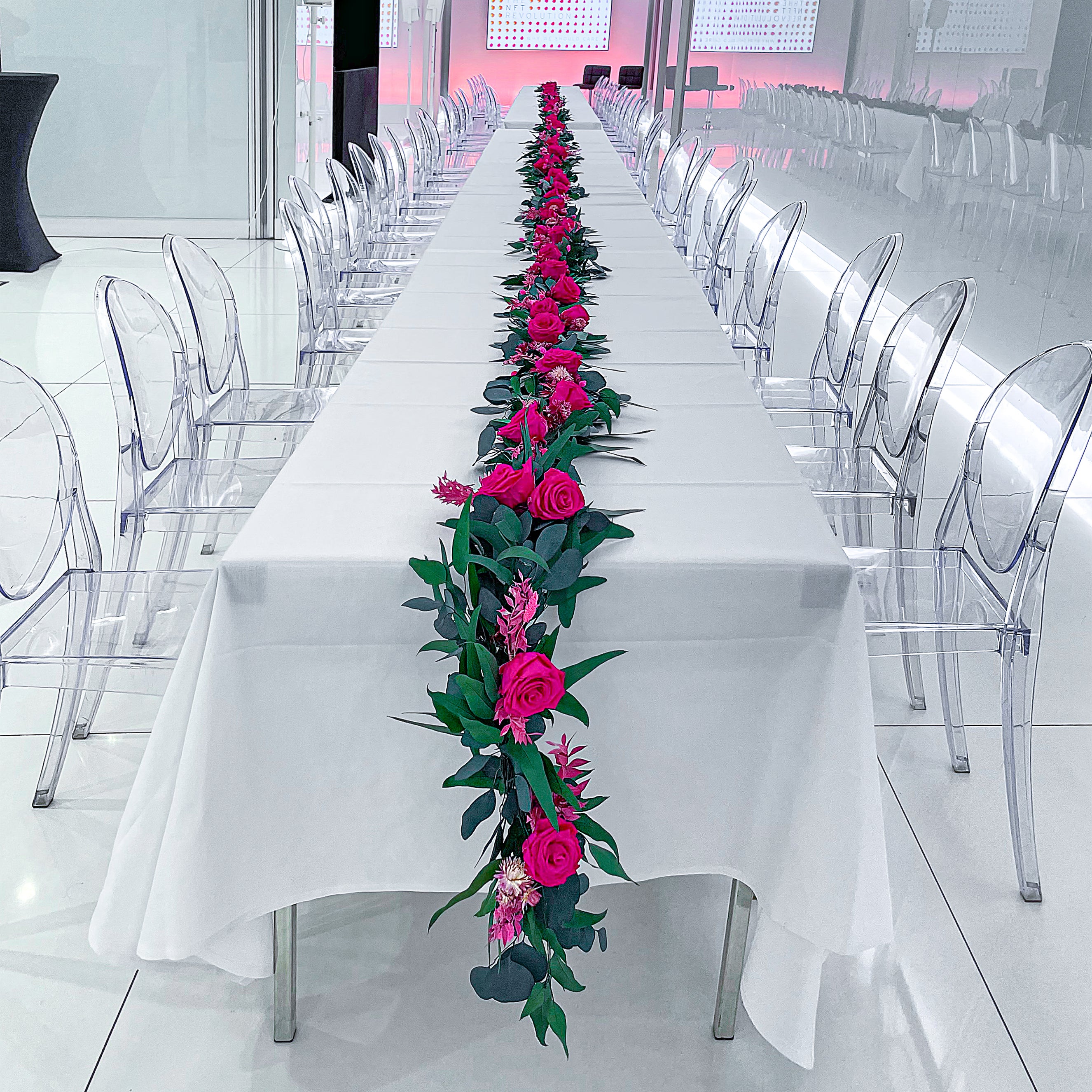 Event florist Amaranté London created a bespoke floral wreath as a part of an event for Citi bank, using a range of sustainable stems and infinity roses. 
