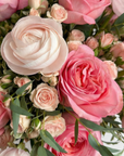 Close-up detail of fresh pink garden roses and ranunculus in the Fresh Flower Bouquet for Mother's Day - Amaranté London