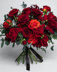 Scarlett Desire is a captivating fresh flower bouquet showcasing exquisite arrangements of elegant red roses in vibrant shades, perfectly symbolising love and affection. This sophisticated and refined bouquet exudes timeless elegance and grace, perfectly designed for a stylish and classy Vday gesture. This polished and luxurious bouquet of roses, available with free UK delivery, is the ideal sophisticated representation of your chic affection.