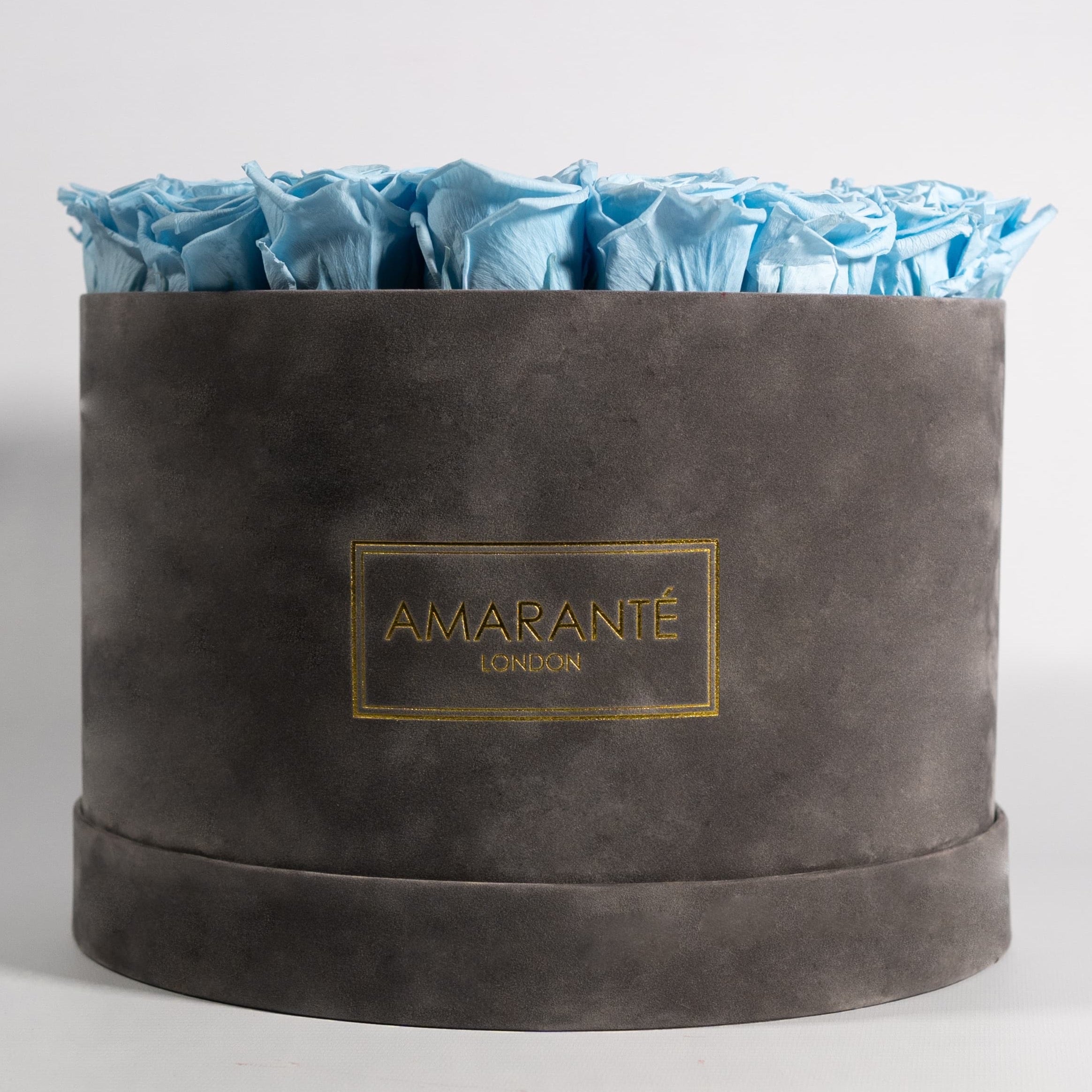 Aromatic light blue Roses in a trendy grey package