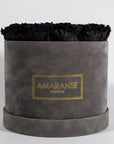Elegant black Roses denoting mystery, elegance, and authority.