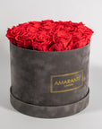Chic red Roses displayed in a stunning grey box