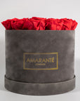 Artful red Roses bursting with fiery colours expressing romance, courage, and determination