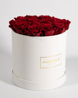 Abloom wine red Roses exhibited in a gorgeous white box 