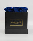Majestic royal blue roses in a dapper black box