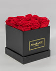 Stunning red Roses featured in a dapper black medium box