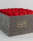 Majestic red Roses in a dapper grey extra large box.