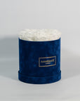 Enchanting white Roses displayed in a captivating blue box
