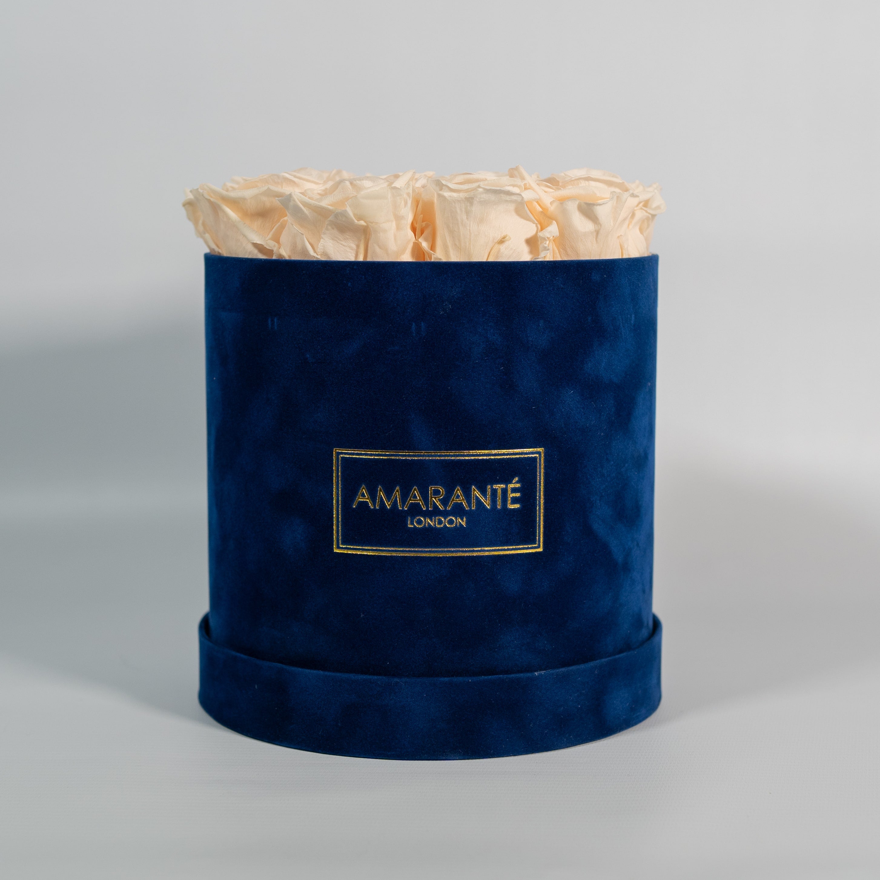 Majestic chmaogne Roses denoting excitement and celebration.