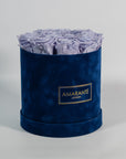 Artful lavender Roses entrenched in an enchanting blue box