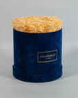 Charming champagne Roses available in a modern blue box