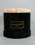 Chic champagne Roses in a contemporary black box