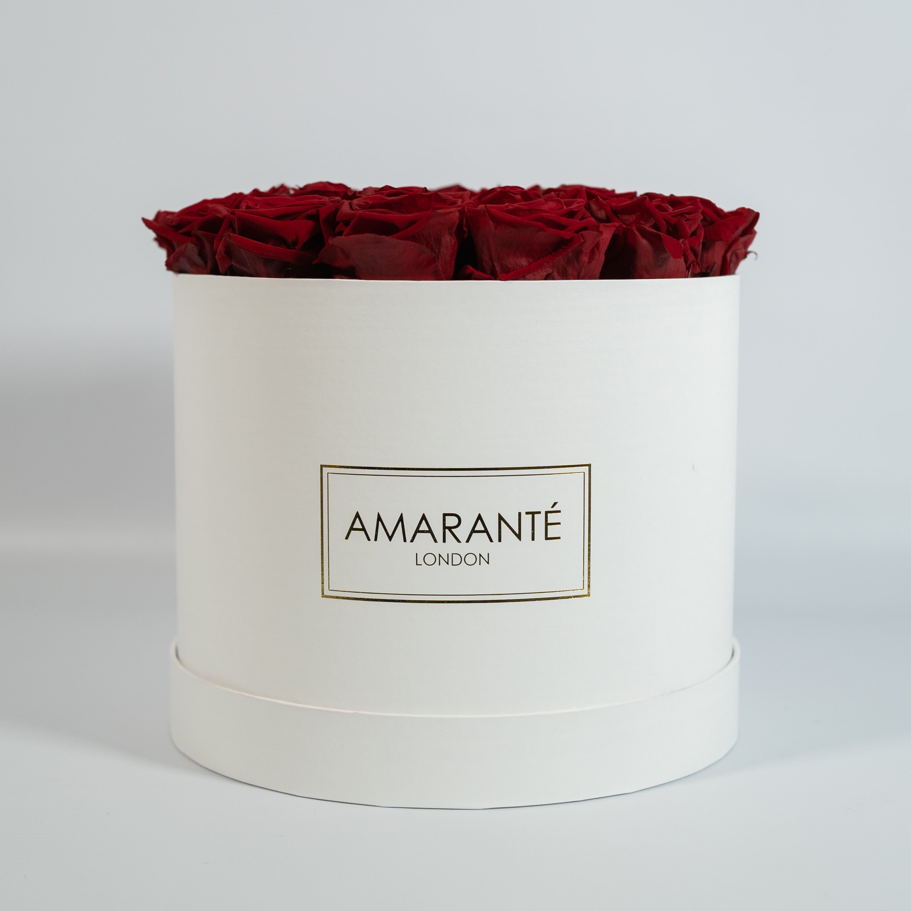 Dreamy wine red Roses manifested in a gorgeous white box