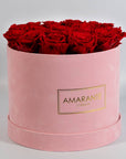 Divine red Roses in a stunning pink suede box
