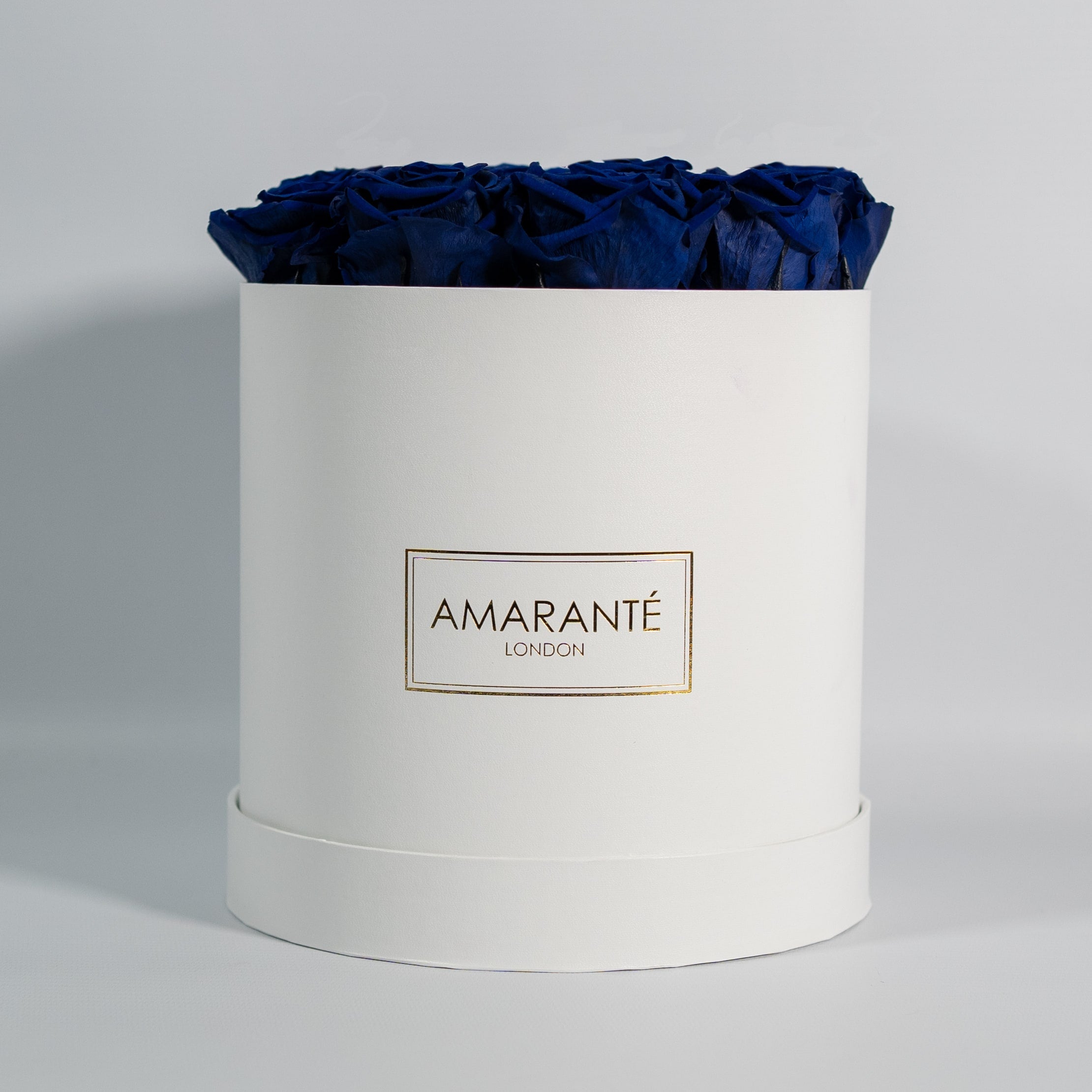 Extravagant royal blue roses connoting luxury, and protection.