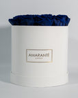 Extravagant royal blue roses connoting luxury, and protection.