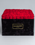 Luxurious black square box of roses, contains 100 large infinity roses, perfect for Valentine's Day, with free UK delivery. Each rose meticulously measures 2-3 inches, available in 14 colours