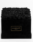 Express your love and affection with our polished black suede rose box filled with 36 intense black infinity roses. Free UK Delivery.