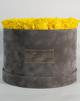 Magical yellow Roses in a dapper ash coloured box