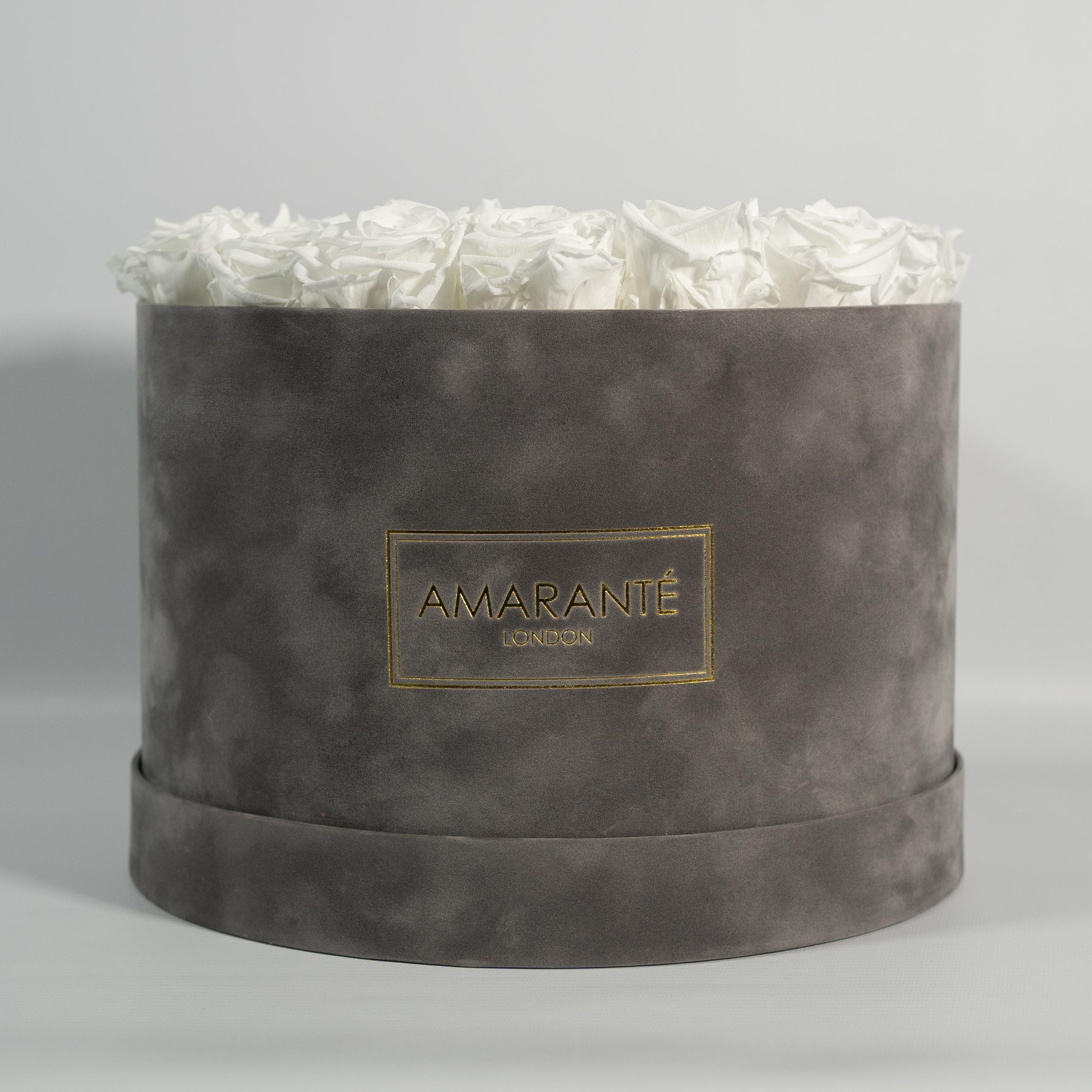 Glorious white Roses in a draemy grey extra large box, ideal for denoting faithfulness.