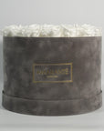 Glorious white Roses in a draemy grey extra large box, ideal for denoting faithfulness.