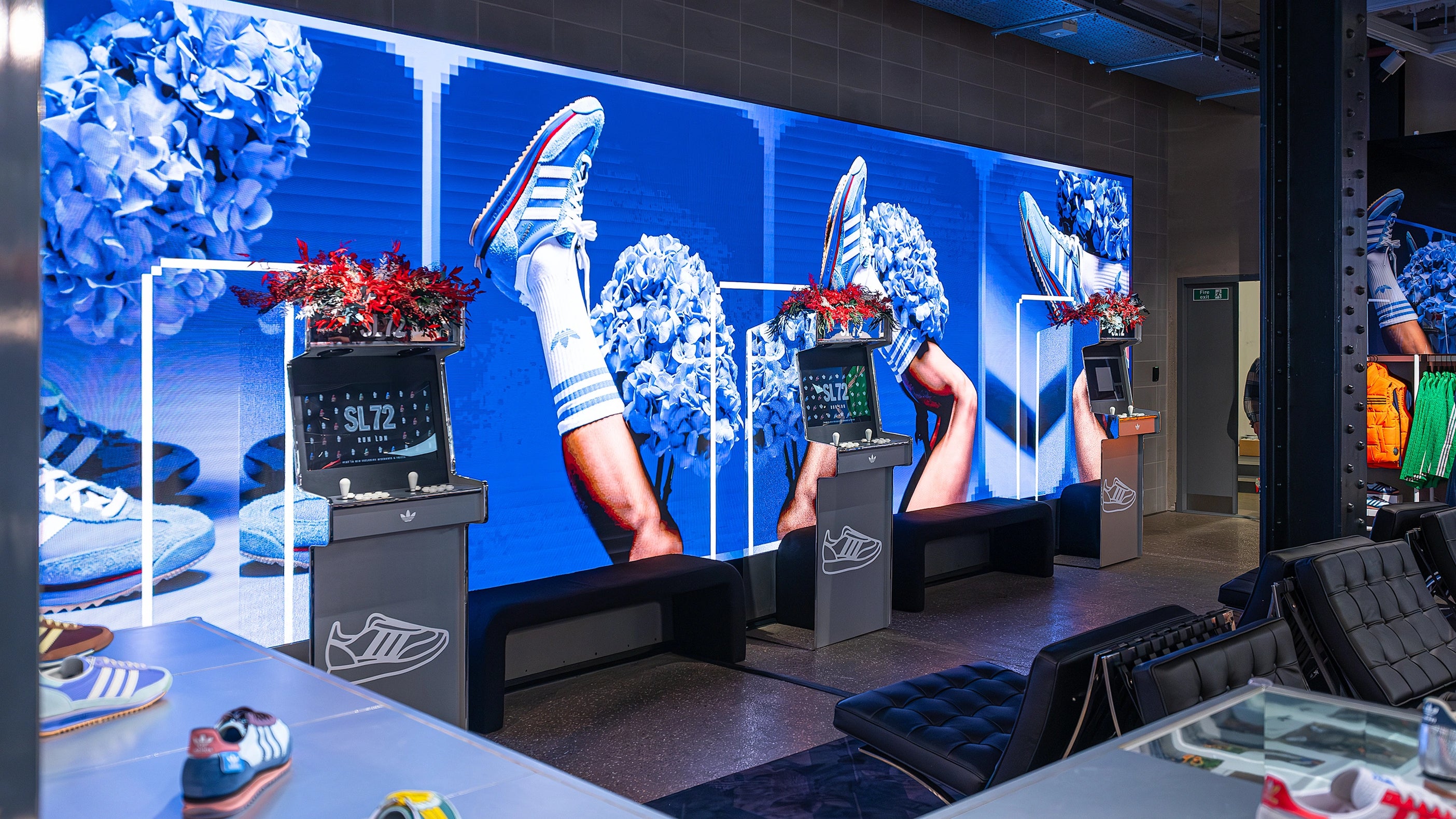 Amaranté London’s floral design for stores: Floral arrangements for the Adidas Bond Street store’s SL72 launch event. A mix of blue and green floral elements enhances the ambience. Tailored to fit the Adidas Brand.
