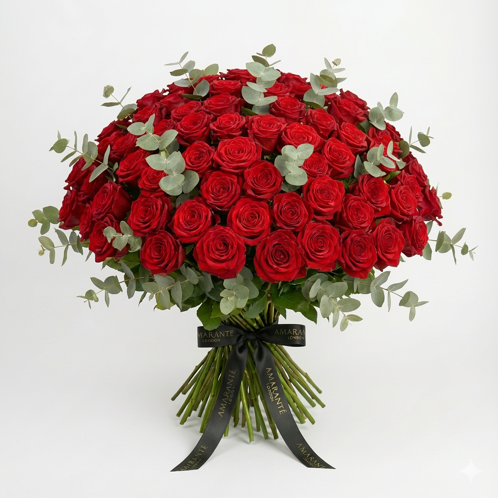 Luxurious dome-shaped bouquet of deep red roses with eucalyptus foliage, finished with elegant black Amarante London ribbon - premium Valentine's Day arrangement showcasing approximately 150 fresh roses in sophisticated hand-tied style - Amaranté London