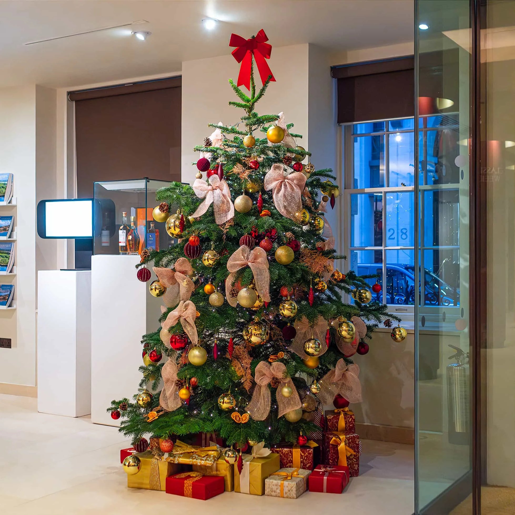 Christmas Tree featuring Amaranté bespoke decorations for Christie's