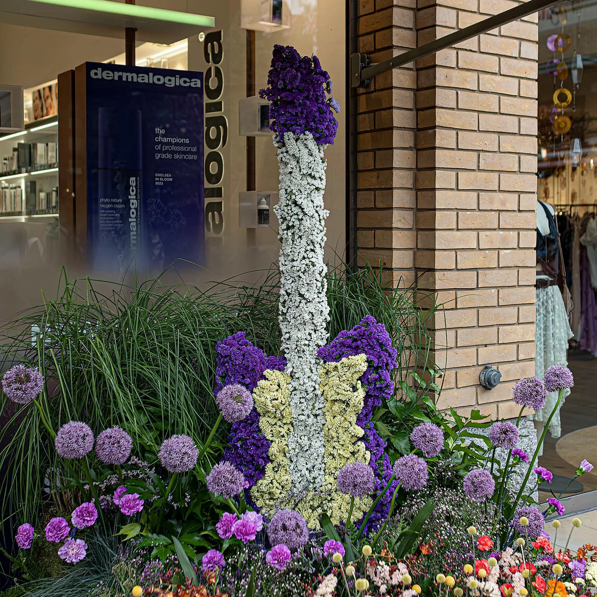 Sustainable forever flowers crafted in the shape of a guitar due to the installation being inspired by Bohemian Rapsody