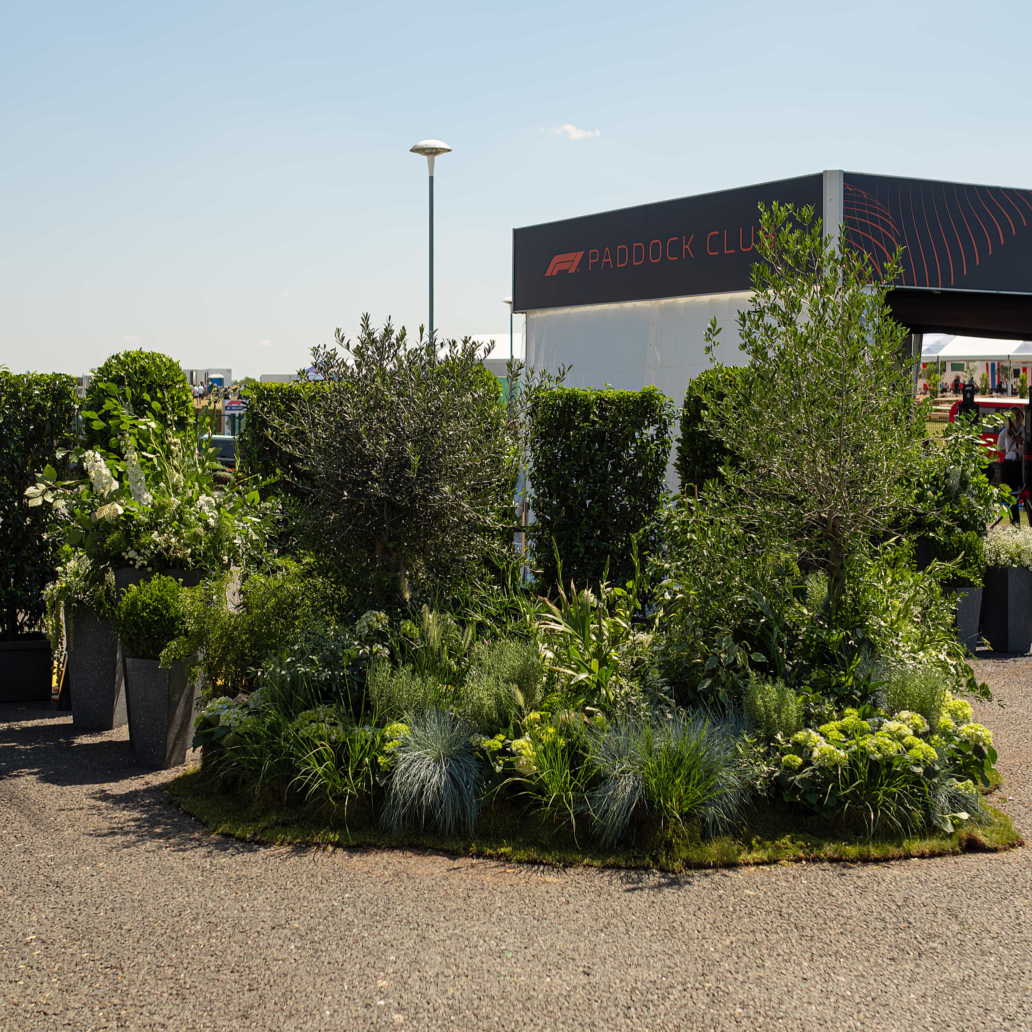 Plant arrangements flawlessly designed to blend with the organic ambiance of a Formula 1 event.