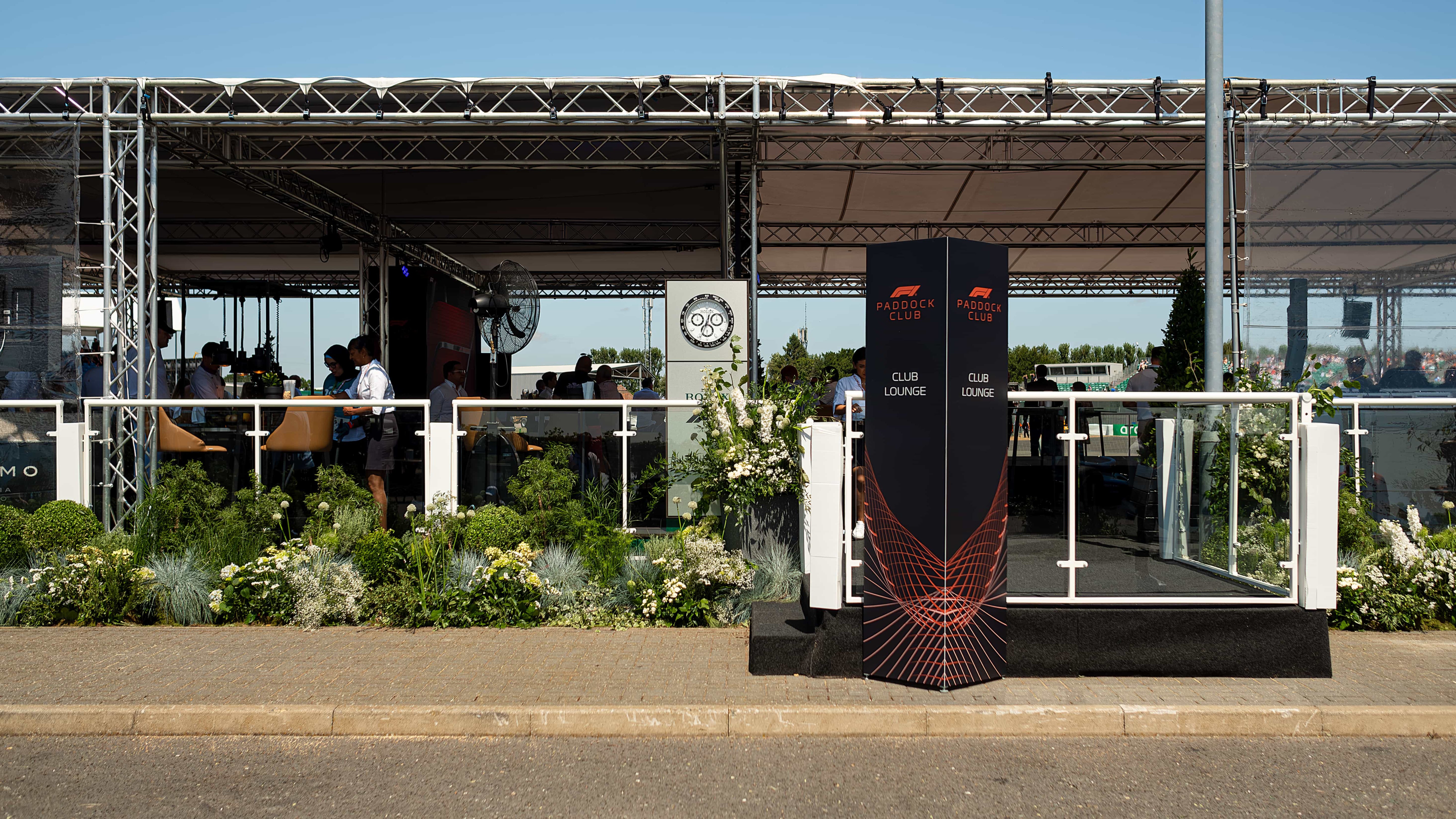 Lush and artfully arranged plant installations enhancing the atmosphere at Formula 1's racing event at Silverstone.