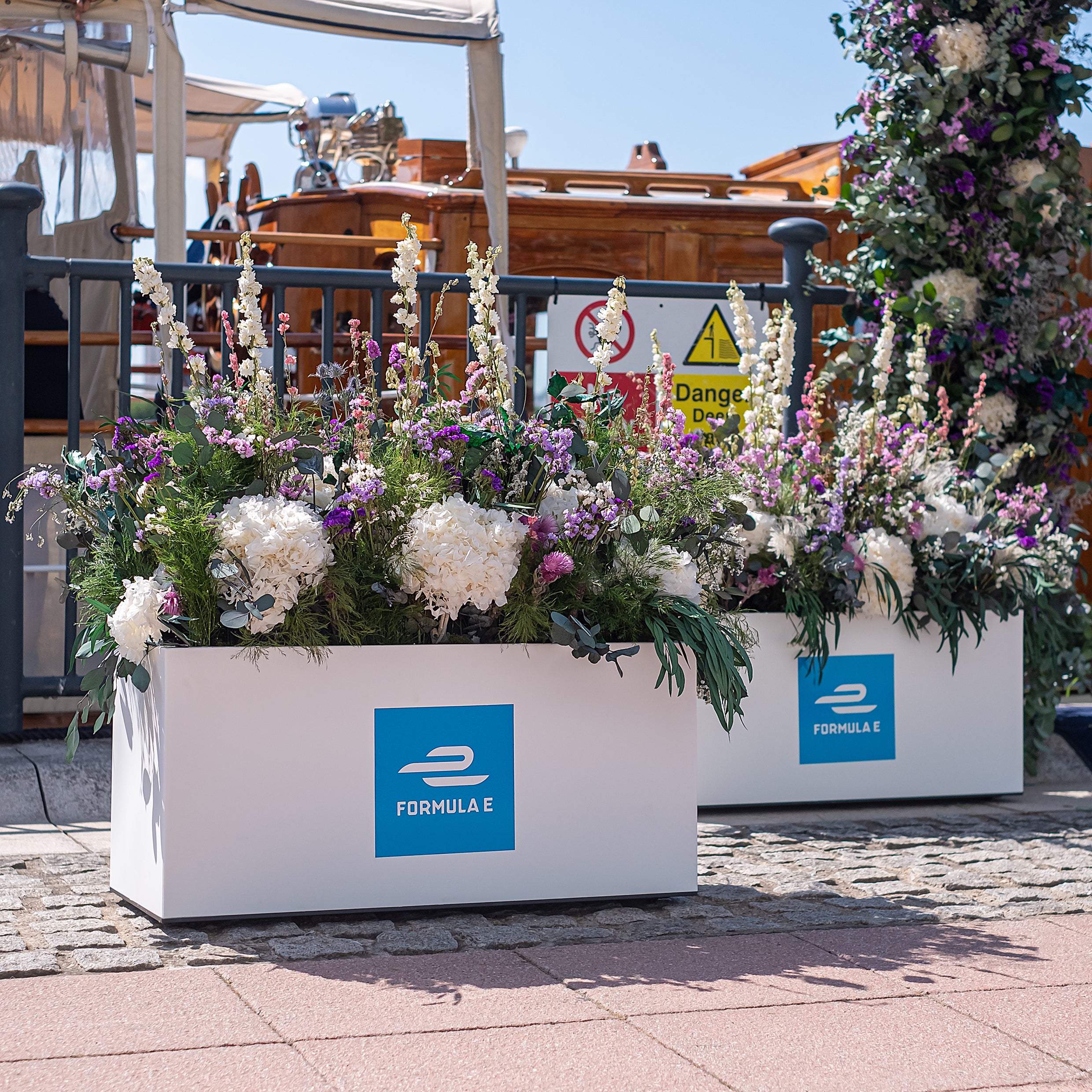 Bespoke planters created for the Formula E event at the excel Centre for their event - Amaranté London Event Florist