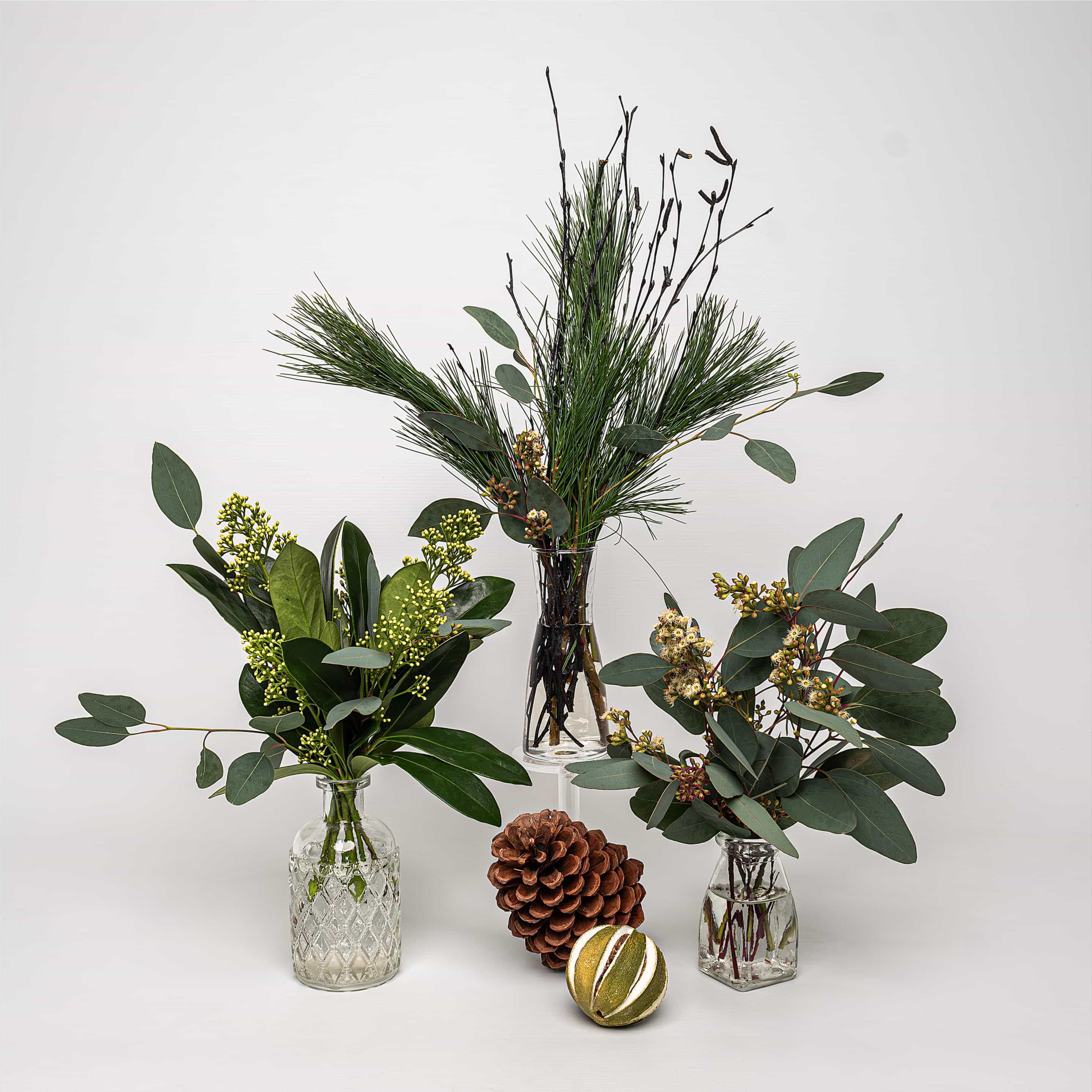 Prague Christmas Collection - Chic trio of Christmas Bouquets: vibrant greens and yellows adorned with golden accents.