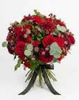 Luxurious Valentine's Day bouquet featuring vibrant red roses, burgundy dahlias, and burgundy astrantia with eucalyptus foliage, tied with elegant black Amarante London ribbon - Amaranté London