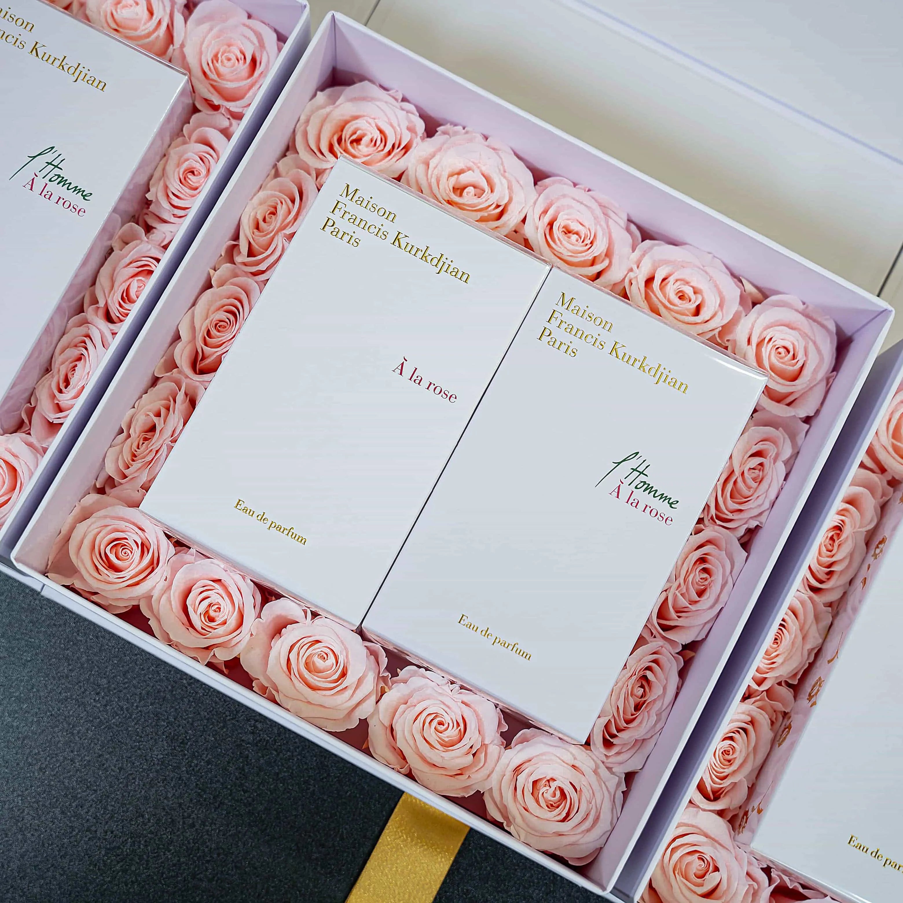 Naturally preserved light pink infinity roses are brought together with a luxurious perfume for an intimate influencer event