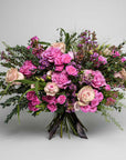 An enchanting bouquet of fresh Valentine's Day flowers featuring a stunning mix of pink roses, symbolising love and affection. This sophisticated arrangement is a chic and stylish way to express your feelings this lover's day. Free UK delivery on this luxury bouquet.