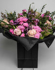 Exquisite Valentine's Day Bouquet of fresh, vibrant pink roses artfully arranged with stems and lavish green leaves. Convey your affection with this sophisticated, luxury bouquet boasting timeless elegance. Perfect for mesmerising your loved one this Vday. Free UK Delivery. Image source: Amarante London.
