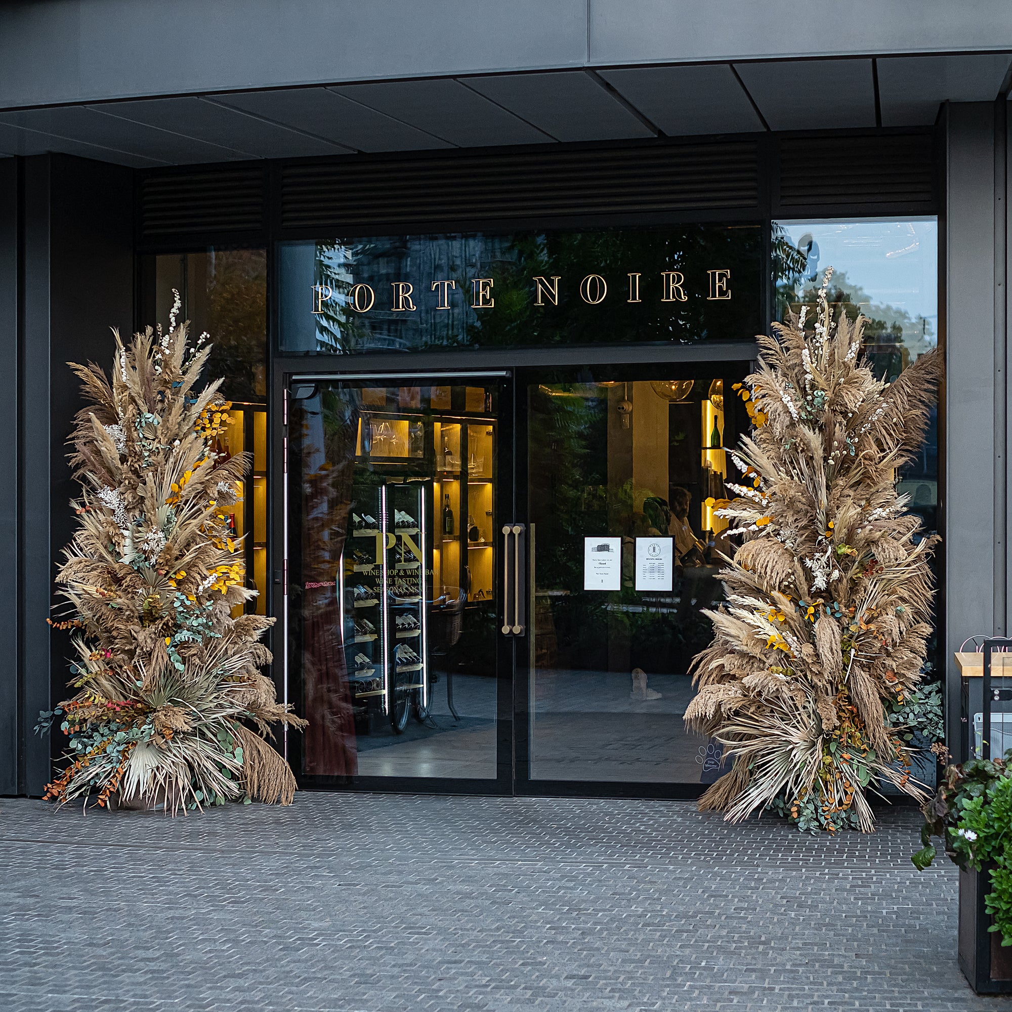 Christmas meets restaurant interior design at the stunning floral installations for Porte Noir by event florist Amaranté London.