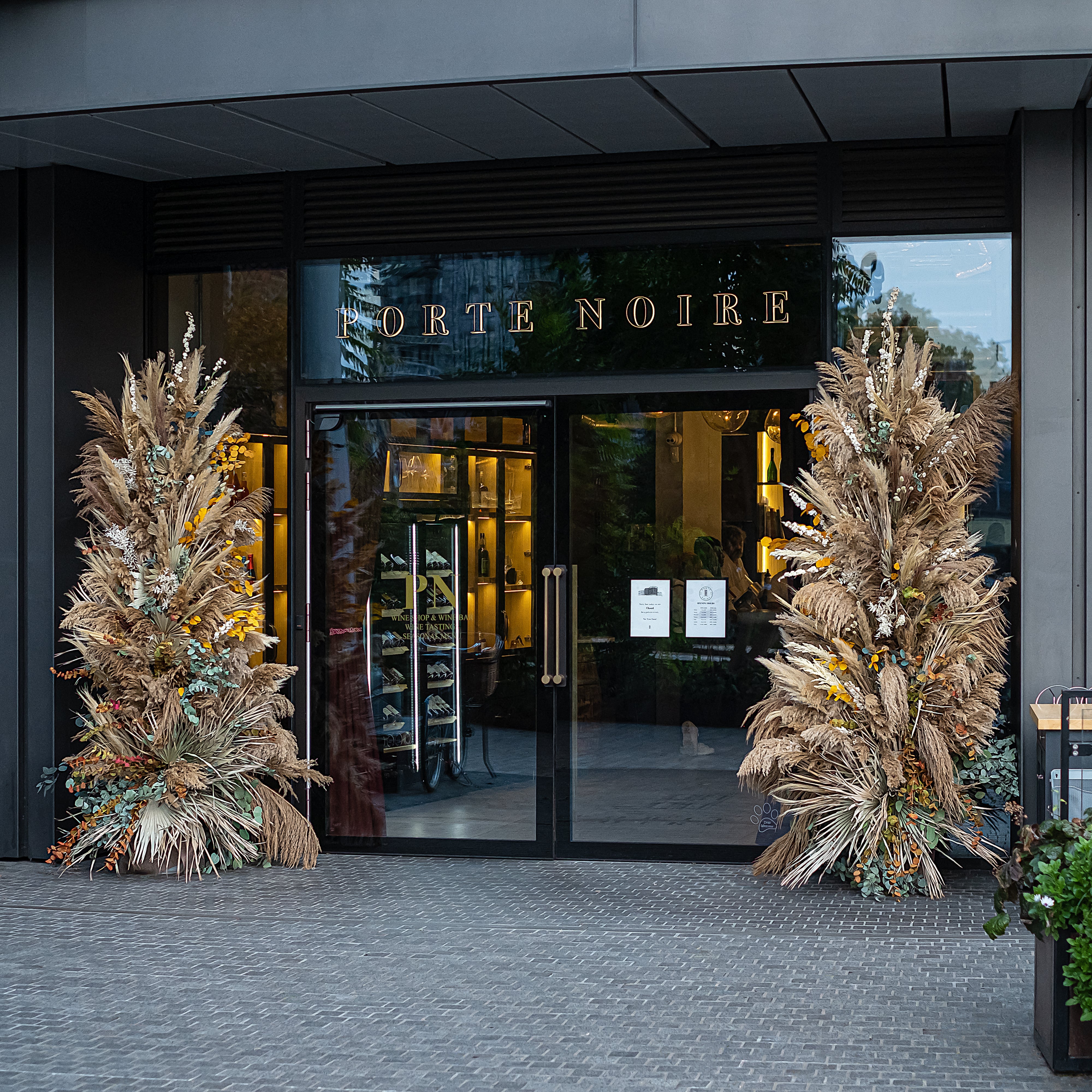 Christmas meets restaurant interior design at the stunning floral installations for Porte Noir by event florist Amaranté London.