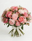 Large Fresh Flower Bouquet with pink garden roses and ranunculus, hand-tied with Amaranté London ribbon. Mother's Day arrangement  by Amaranté London