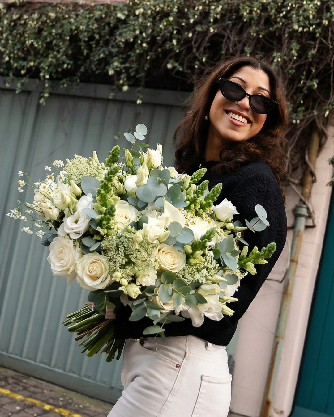 Two images: one of a woman holding a bouquet of white and green flowers with a blurred background, and another of a man holding a 100 roses bouquet overlooking St. Pauls cathedral