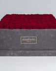 Super deluxe grey square hatbox with 150 deep-red infinity roses, offering a touch of elegance and everlasting love. Free UK delivery. Luxurious 20"x20" Rose Box, Roses are customisable in 14 delicate pastel colours.