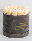 Delicate champagne Roses available in a sleek grey box 