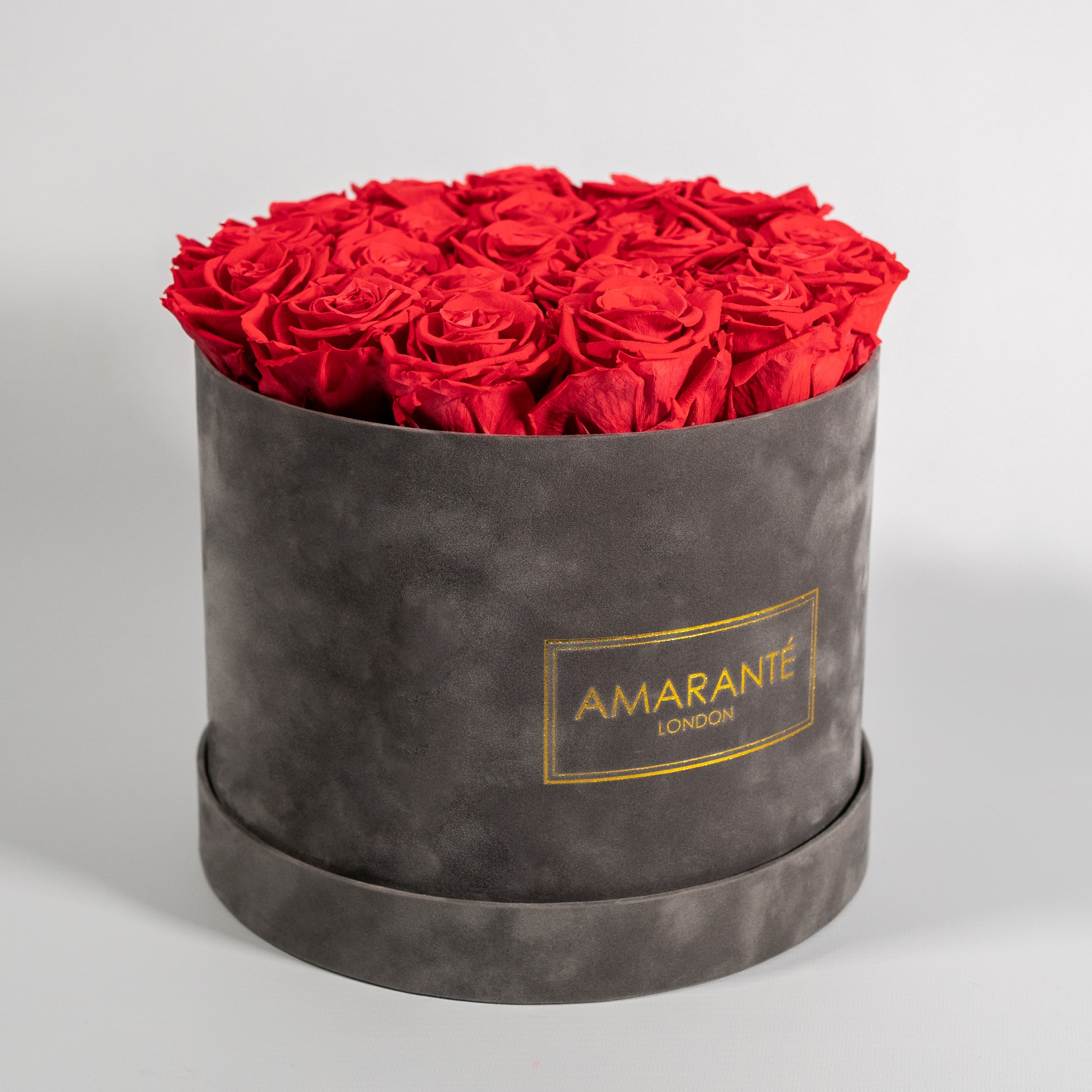 Chic red Roses displayed in a stunning grey box 
