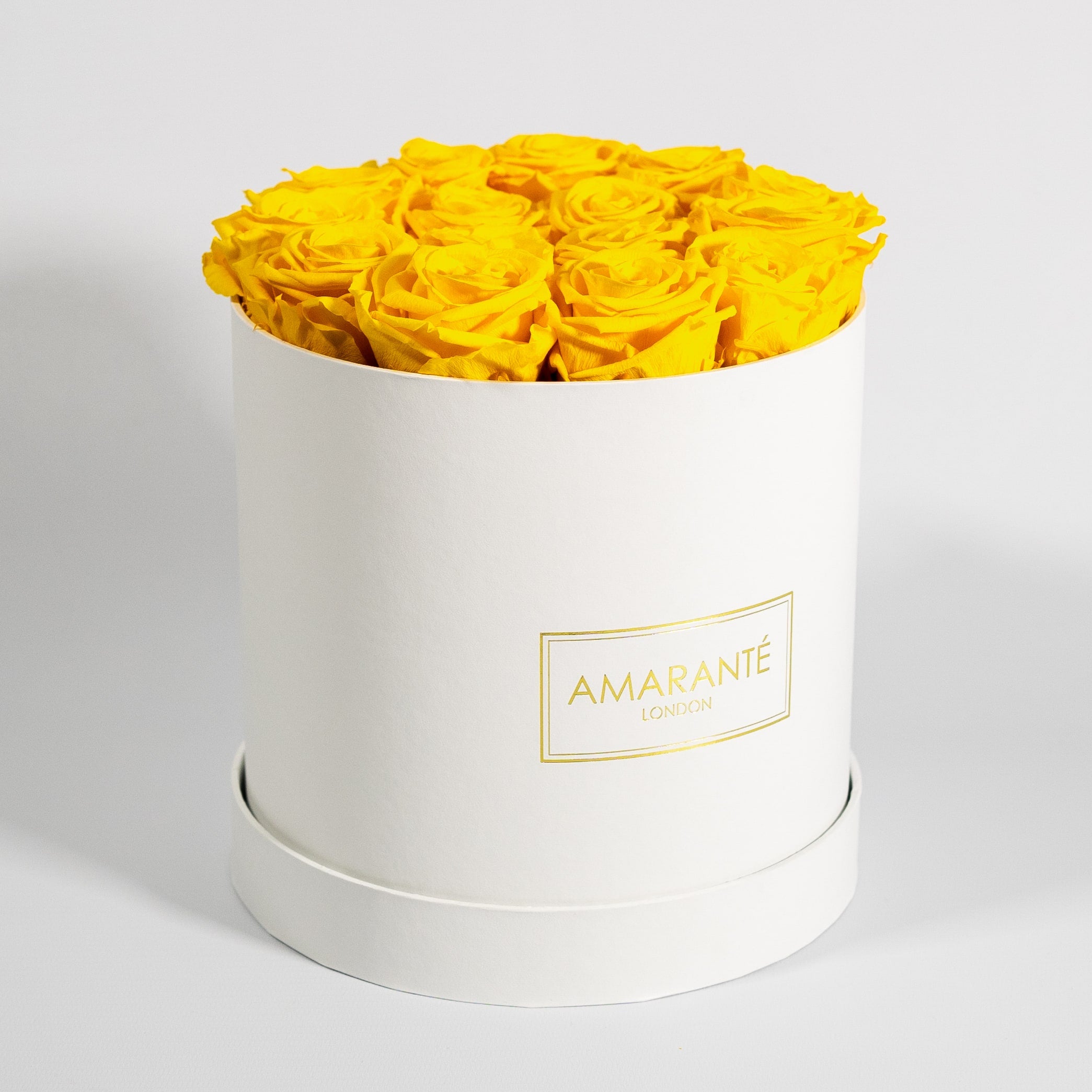 Warm yellow Roses embellished with summer inspired colours. 