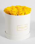 Warm yellow Roses embellished with summer inspired colours. 