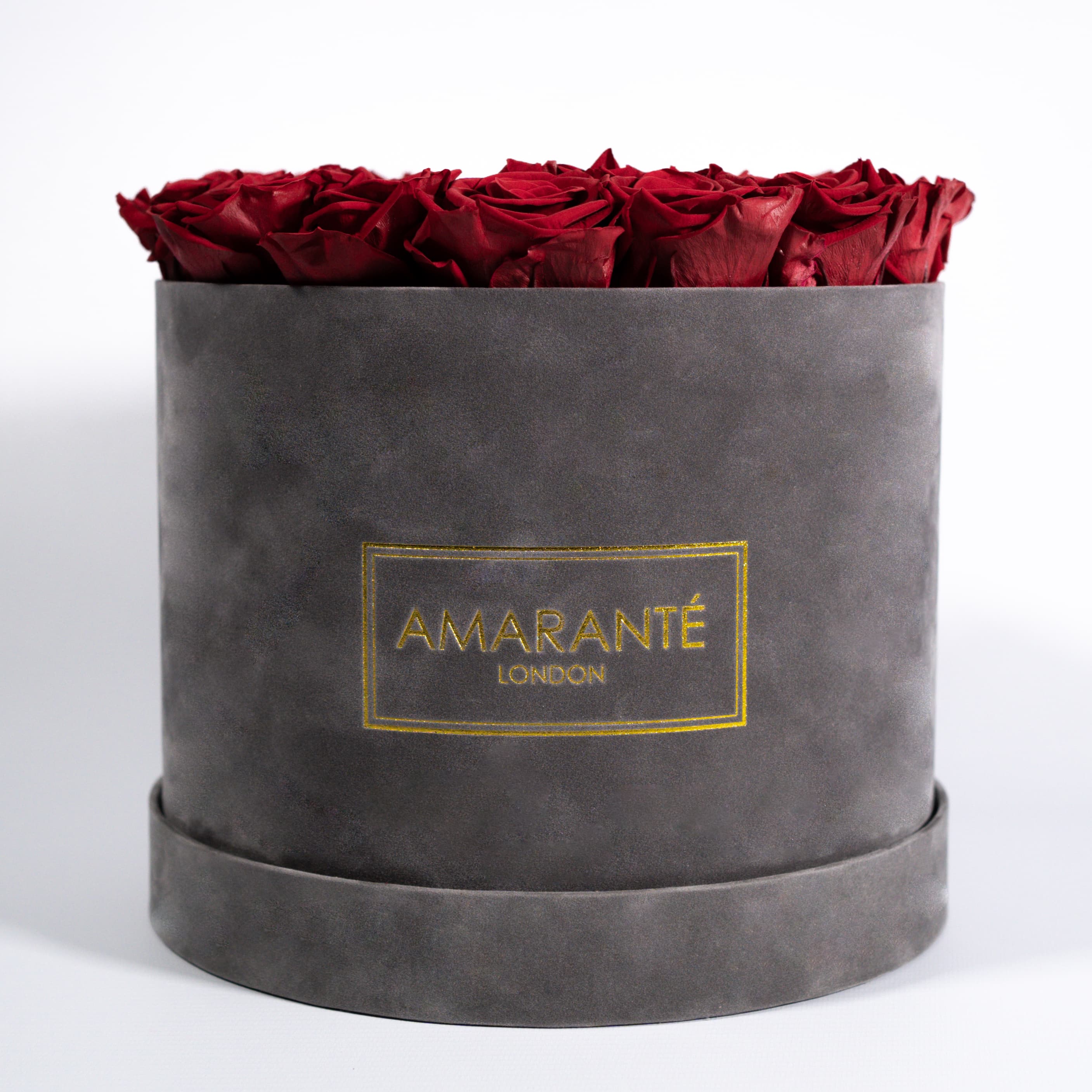 Gorgeous wine red roses in a modern grey large box  