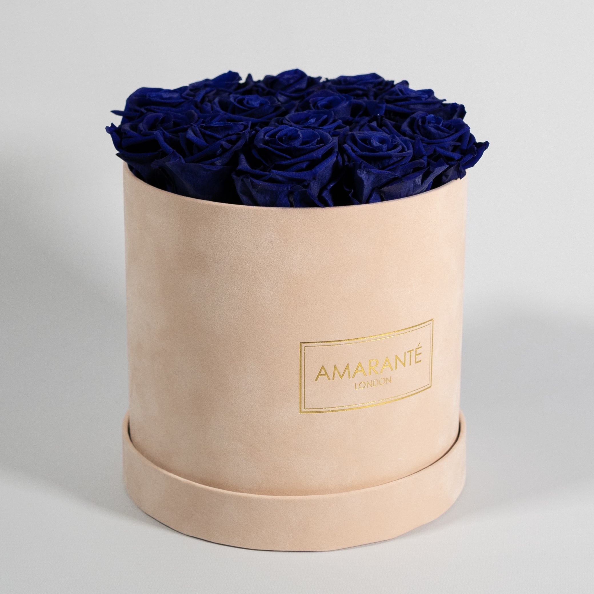 Dapper royal blue roses denoting luxury, royalty, and protection. 