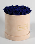 Dapper royal blue roses denoting luxury, royalty, and protection. 