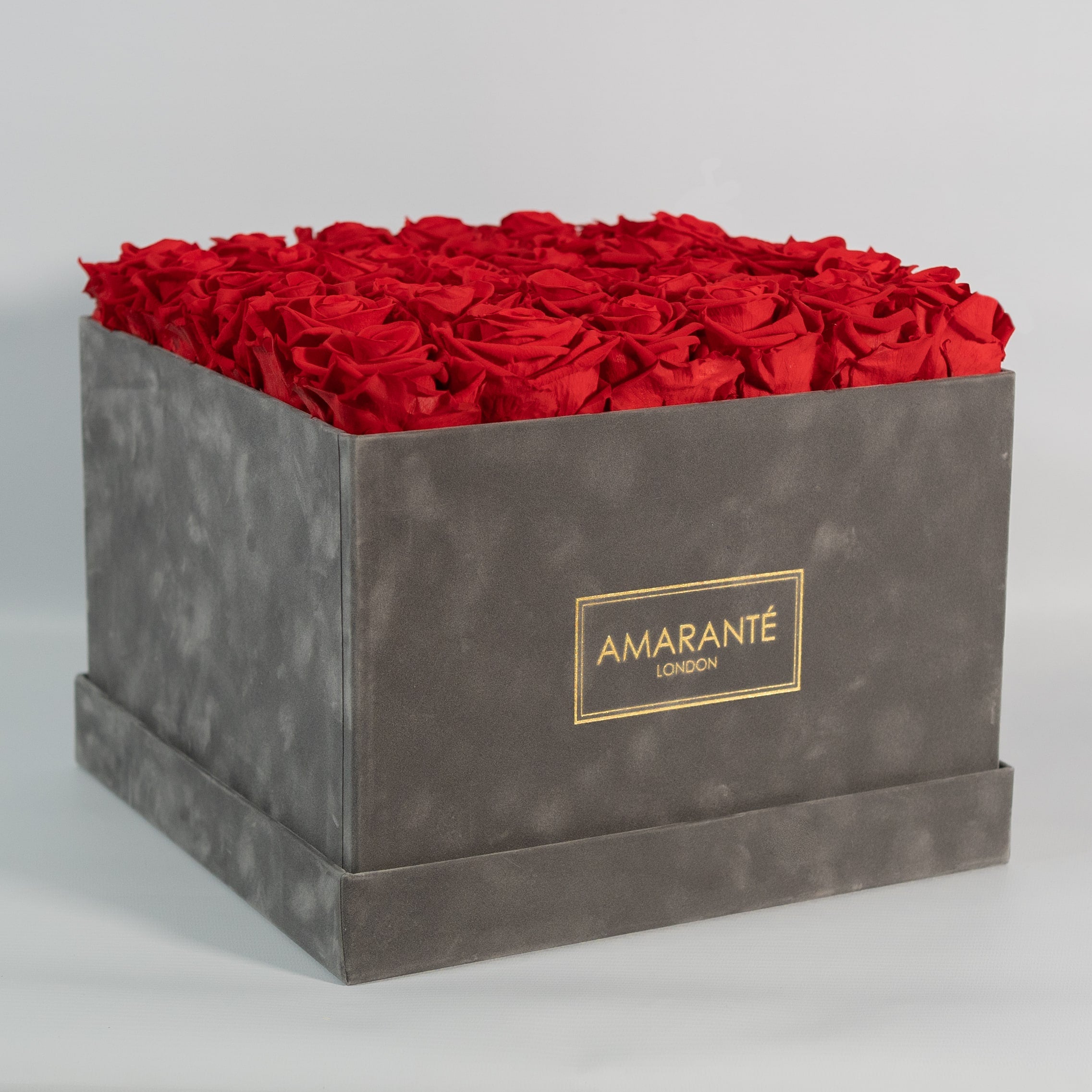 Majestic red Roses in a dapper grey extra large box. 